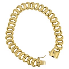 Bracelet souple en or jaune signé par Nanis