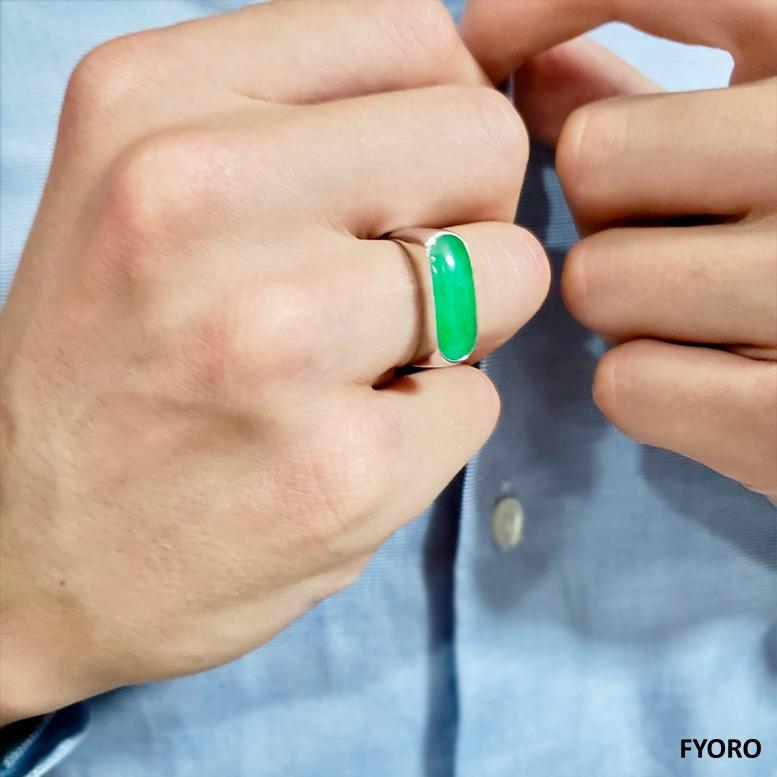 Green Jade Cocktail Ring with solid 14K White or Yellow Gold (Hallmark Stamped) for men and women (unisex). 

The 'Nanjing Royal Jade Ring' symbolizes one of the most powerful, historical capitals of China, 'Nanjing'. It's sturdy, bold design shows