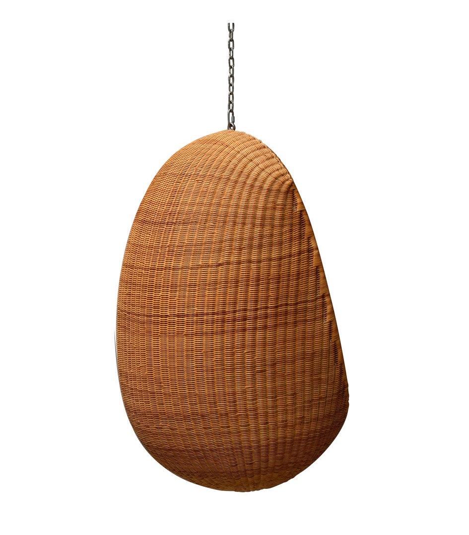 The egg-shaped hanging chair is made of woven cane. The loose cushion has detachable wool covers.
Designed in 1957, produced circa 1959 by Bonacina Pierantonio, Italy.
Suspension chain included

Nanna Ditzel (1923-2005)

Nanna Ditzel, with her