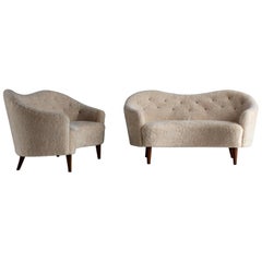 Nanna Ditzel 
Attribution
 Paar Sofas/Liegesessel:: Schaffell:: Buche