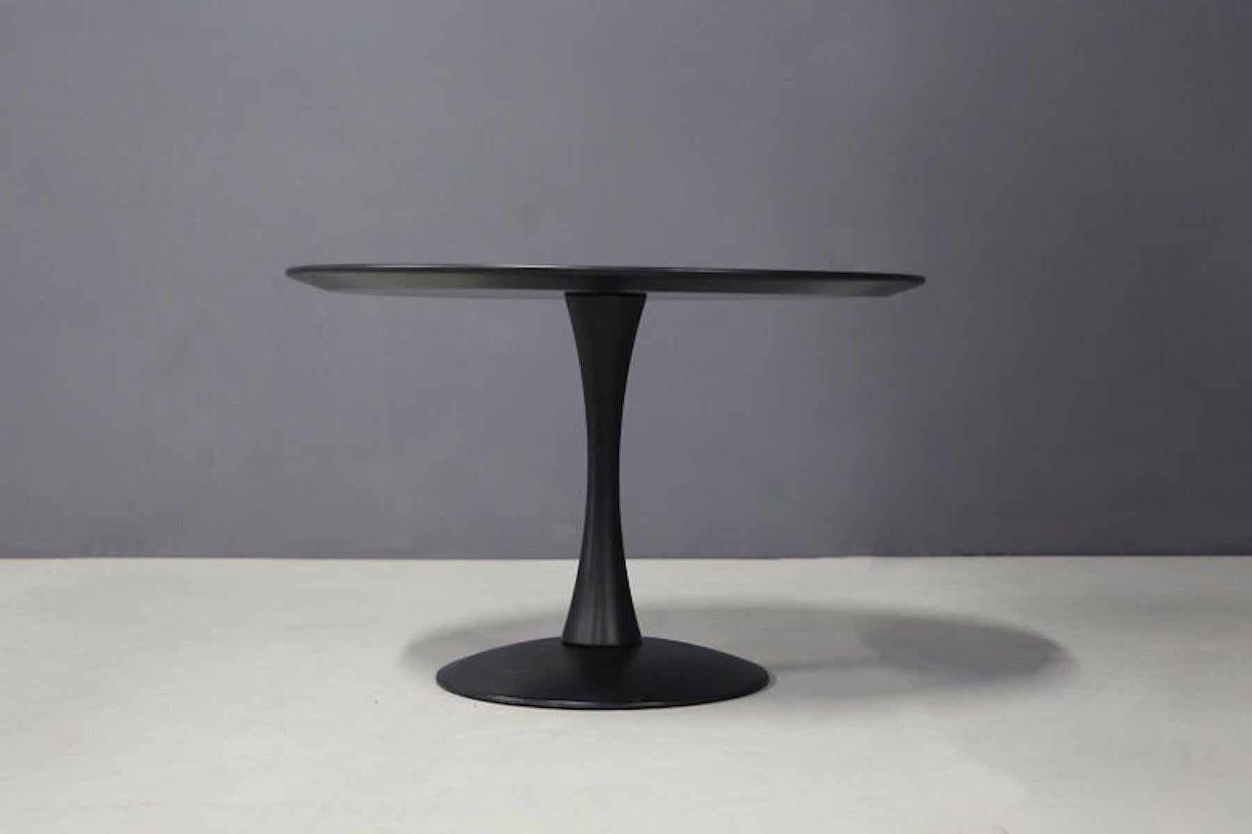 Nanna's 1960s coffee table. Consisting of purely circular elements, clean and essential elements characterize the line of Nanna. In ebonized wood is in good condition vintage slight traces of wear due to time.
We can place it in a living room with