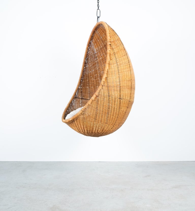 Original suspension egg chair by Nanna Ditzel, Italy mid century

We have a pair available, priced per piece.

The egg-shaped hanging chair is made of woven cane. It has a great aura and high comfort qualities. The loose cushion (we have one