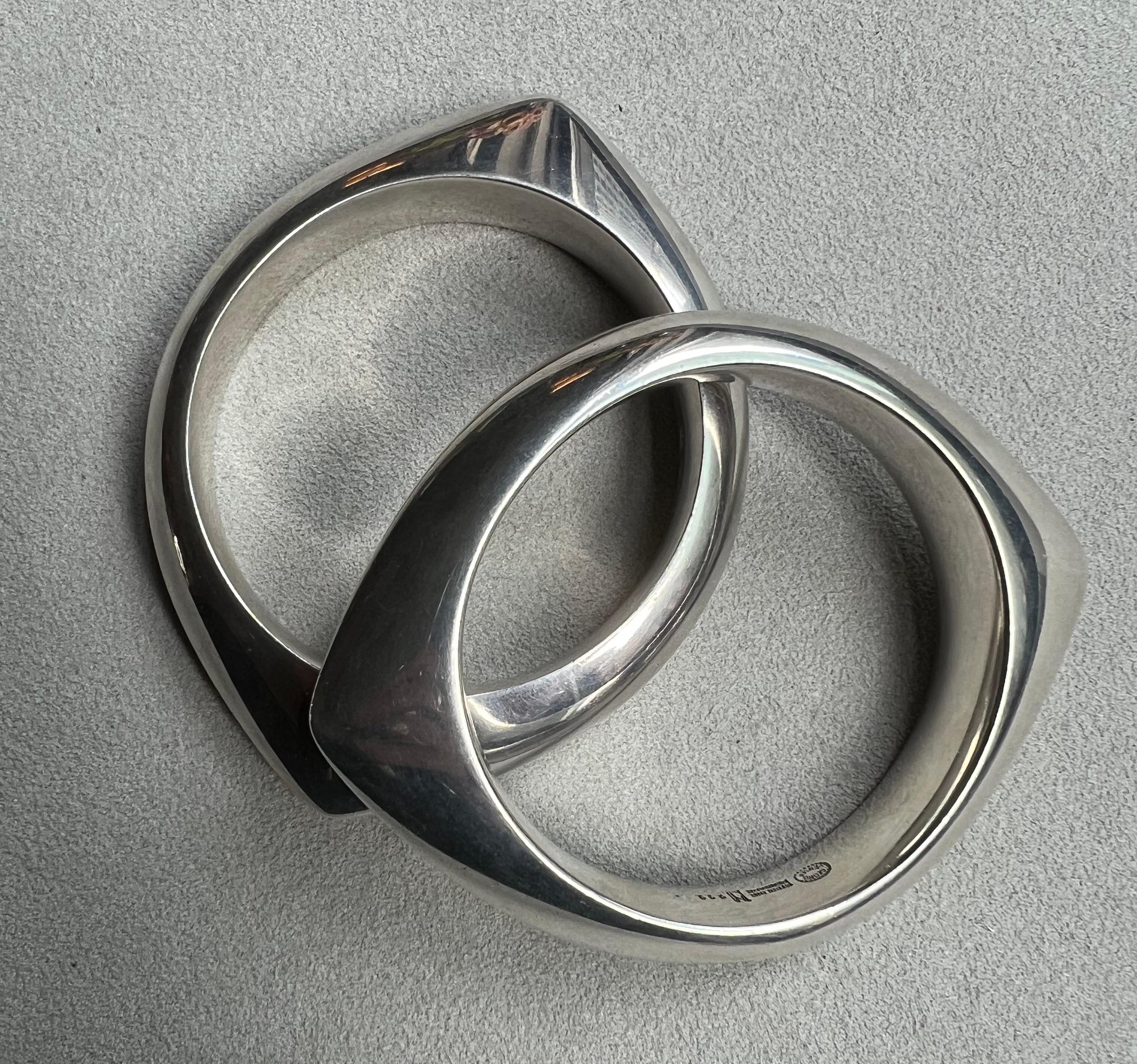 A set of two sterling silver Nordic 