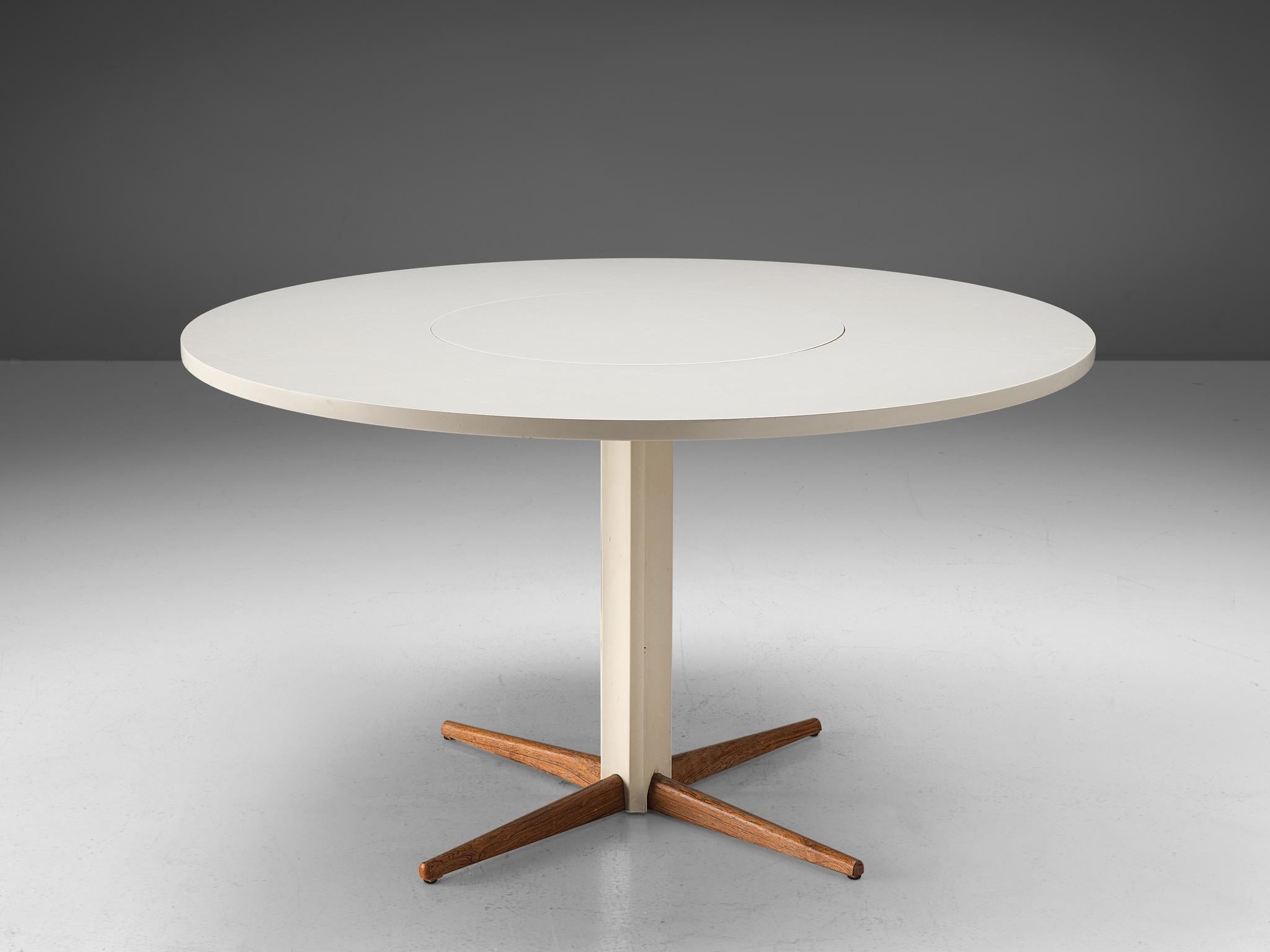 Nanna Ditzel for Kolds Savvaerk, pedestal table, wood, Denmark, 1950s

This elegant table has a slim base, well made with four tapered legs in solid wood. As the rest of the table is laquered white and the four legs show, their natural wooden