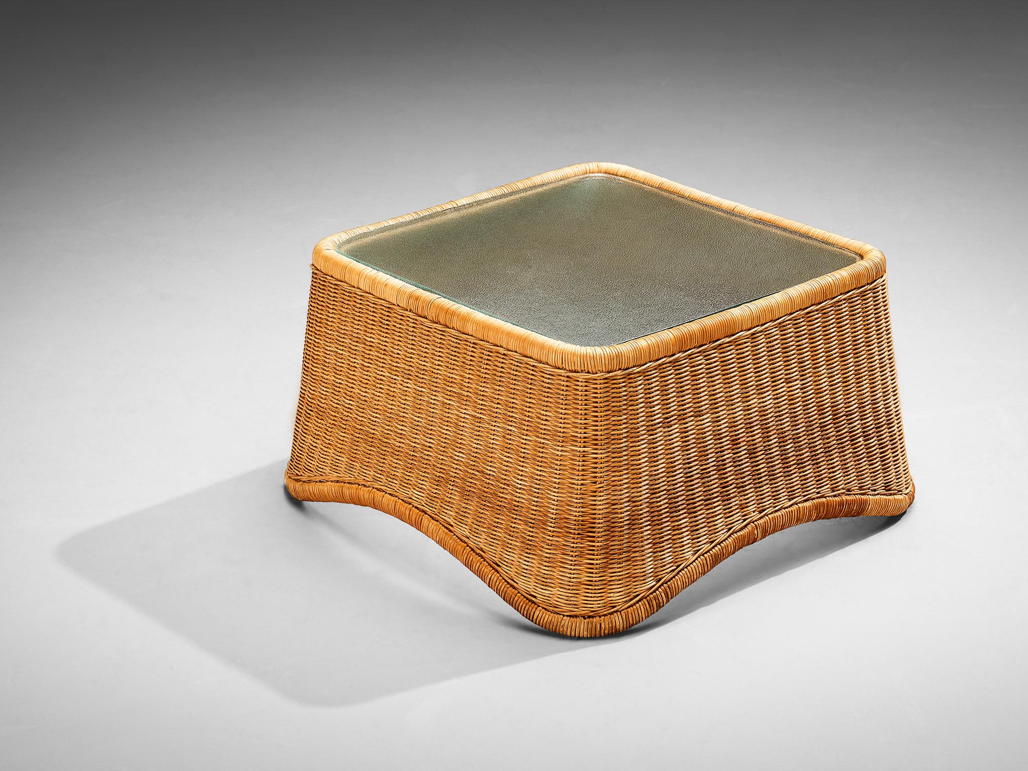 Nanna Ditzel for R. Wengler, coffee table, rattan, textured glass, Denmark, designed 1961, manufactured 1960s-1970s

Designed by Nanna Ditzel in 1961, this coffee table embraces an organic design. The rattan work was crafted by R. Wrengler, a