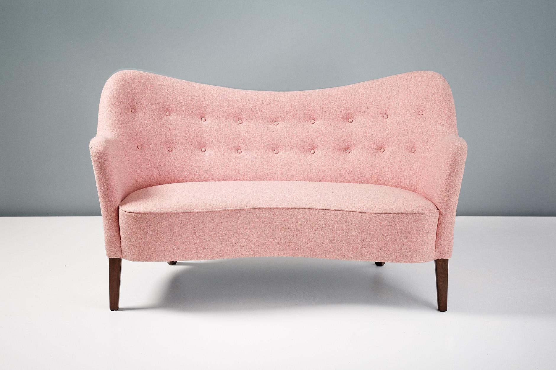 Model 185 sofa, 1952

Rarely seen curved loveseat sofa attributed to Nanna Ditzel and produced by Danish cabinetmakers Slagelse Mobelvaerk. Stained beech legs and new wool felt upholstery from Abraham Moon.