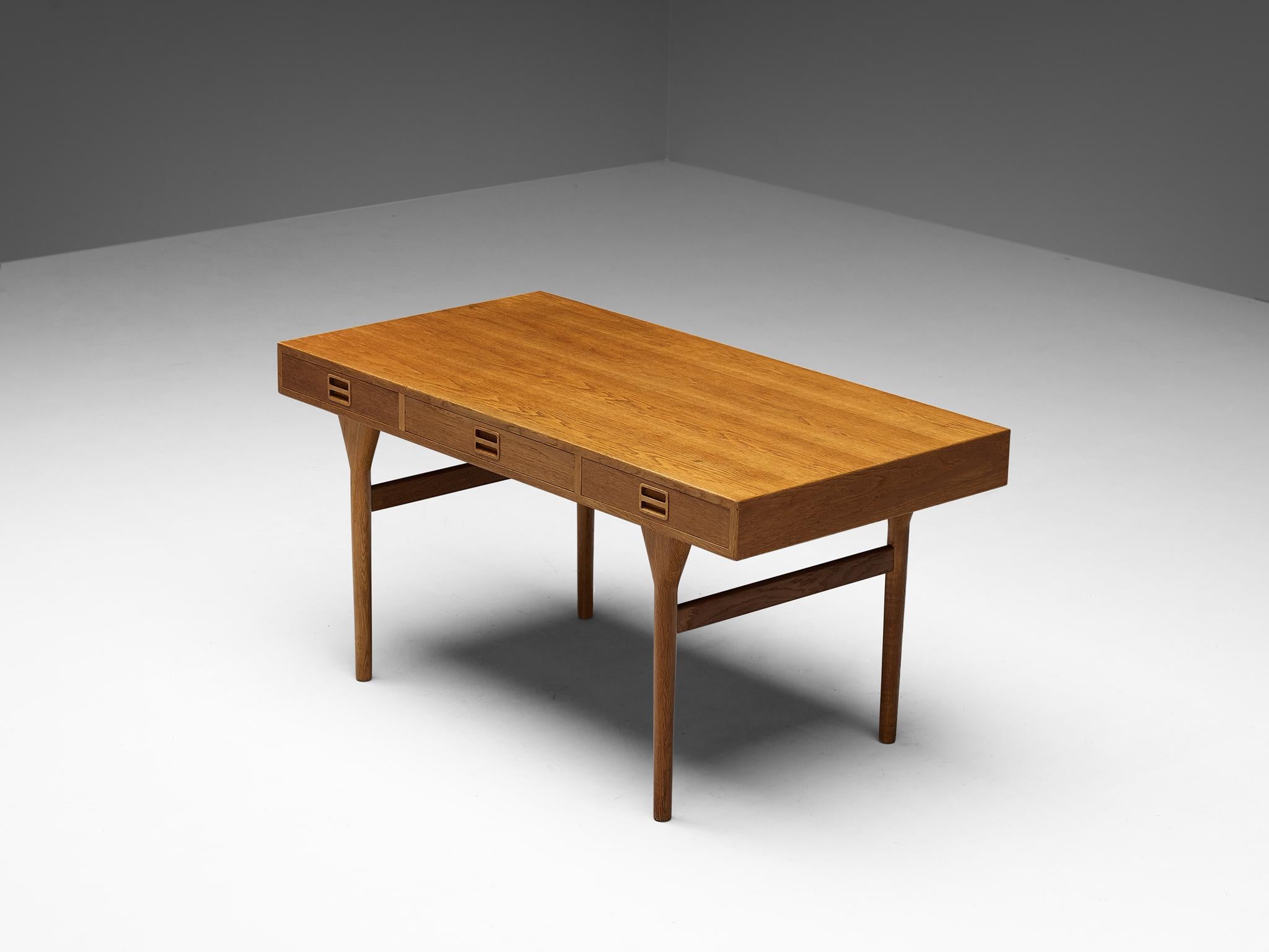 Nanna Ditzel for Søren Willadsen Møbelfabrik, desk, oak, Denmark, design 1955

A beautiful freestanding desk designed by Nanna Ditzel. Flawless in its design and execution, this piece is very slim and elegant. The oak wood is giving this desk a
