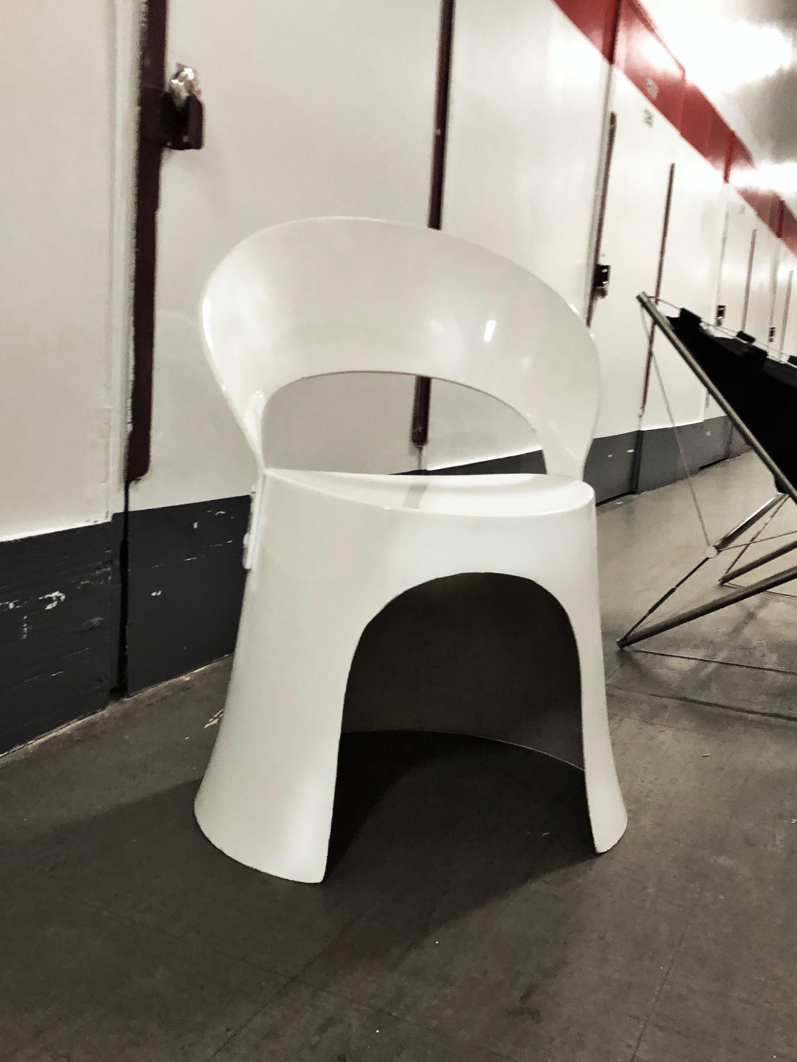 Nanna Ditzel Mid-Century Danish Modern White Fiberglass Chair, 1969.  Listing is for one chair.  Four available. 

Nanna Ditzel brought her talents to bear on a staggering array of forms — she designed furniture, jewelry, tableware and textiles; and