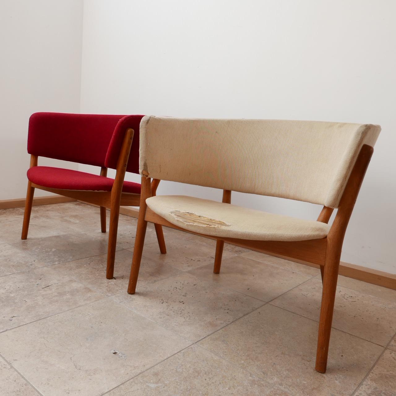 Wildly stylish armchairs by Nanna Ditzel. 

ND83 model. 

Designed by Ditzel in 1952, manufactured by Søren Willadsen, Denmark

Denmark, c1950s. 

A wide open lounge chair that is very comfy and a design classic. 

Oak frames, the red