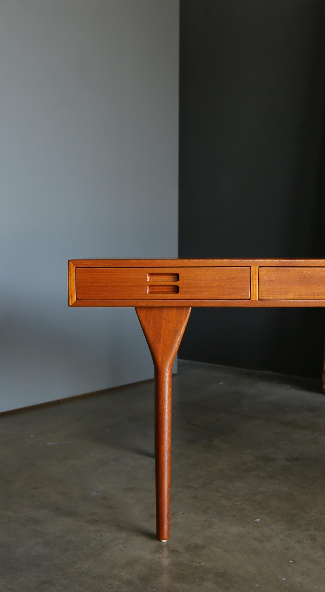 Nanna & Jørgen Ditzel teak desk for Søren Willadsen. Denmark circa 1958. This piece has been professionally restored.