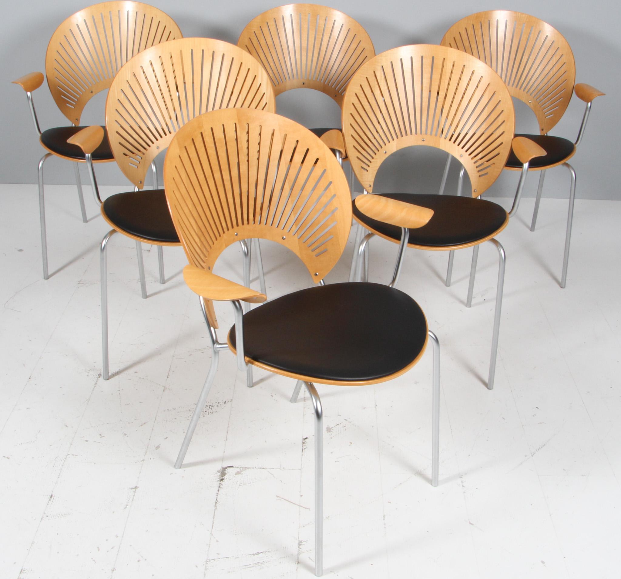 Nanna Ditzel Trinidad is one of Nanna Ditzel's greatest successes. Designed in 1993, it has long since achieved the status of modern Classic. The distinctive chair takes its name from Trinidad, whose traditional fretwork techniques inspired Ditzel.