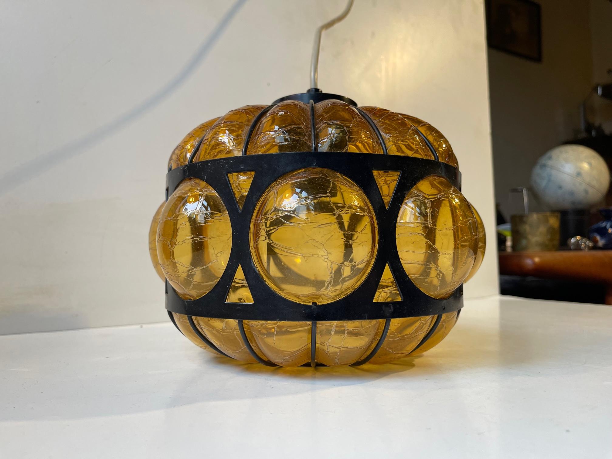 Mid-20th Century Nanny Still Caged Amber Glass Pendant Lamp, RAAK, 1960s For Sale