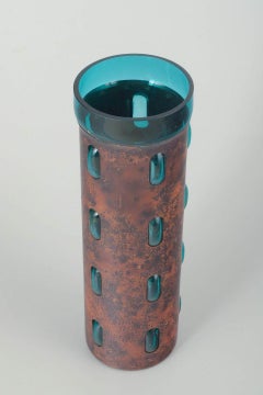 Nanny Still for Raak. Vase in hammered copper with a bluish-green glass insert.
