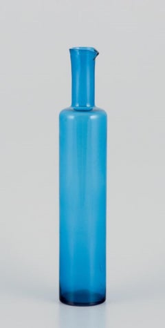 Nanny Still for Riihimäen Lasi, Finland. Vase/bottle in petroleum blue art glass