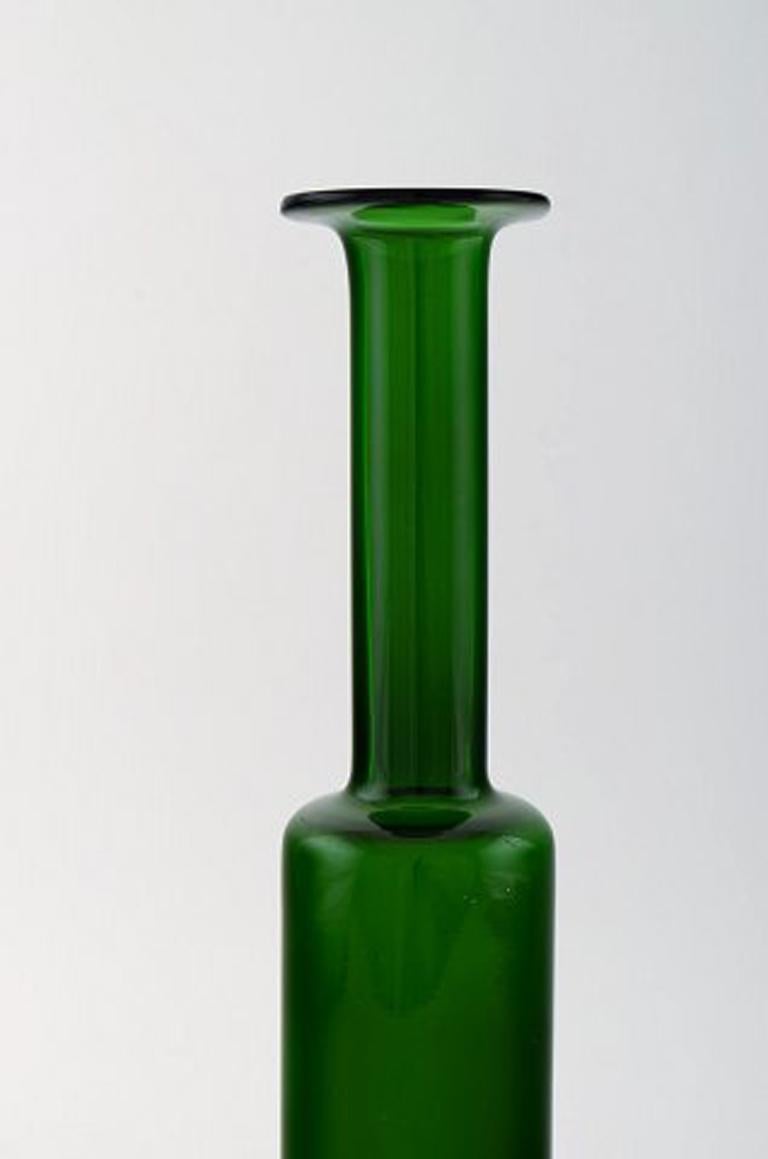 Nanny Still for Riihimäen Lasi, Finnish art glass decoration bottle vase.
In perfect condition. Beautiful green color.
1960s-1970s.
Measures: 32 x 6 cm.
Stamped.