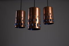 Nanny Still, set of 3 copper pendants for Raak Amsterdam, 1960s