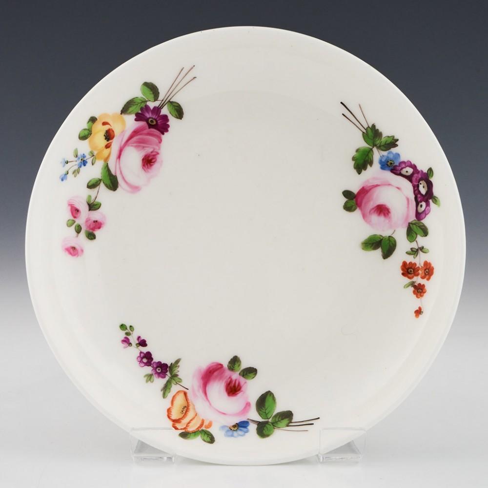 Nantgarw Porcelain Coffee Can and Saucer, c1820

Additional information:
Date : c1820
Period : George III - William IV
Marks : none
Origin : Nantgarw, Wales
Colour : Polychrome
Pattern : three small posies of flowers with leaves on both