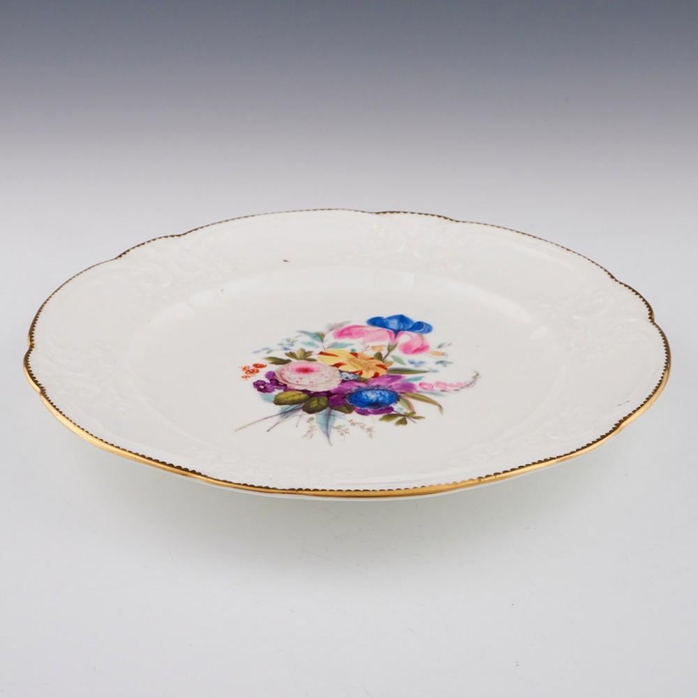 Nantgarw Porcelain Dinner Plate, c1820

Additional information:
Date : c1820
Period : George III/George IV
Marks : Impressed NANT-GARW C.W. 
Origin : Nantgarw, South Wales
Colour : overglaze polychrome enamelling and gilding
Pattern : gilt dentile