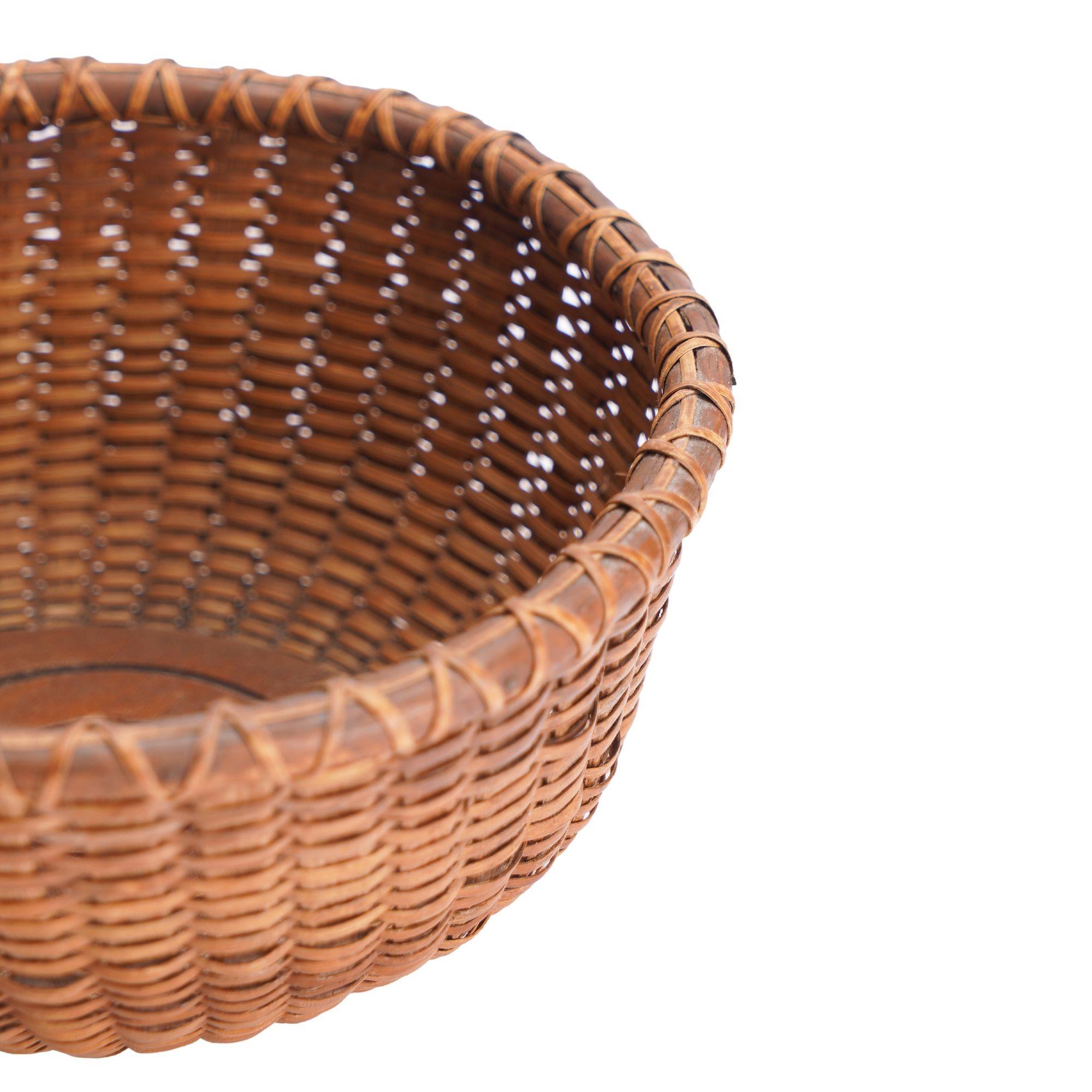 Bamboo Nantucket basket attributed to the Coffin School, 1900's For Sale