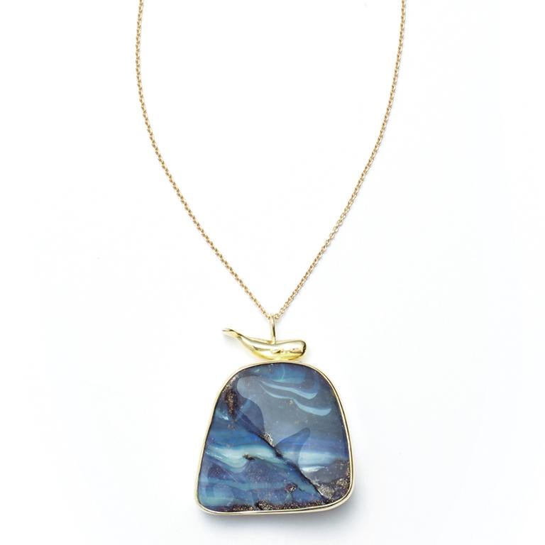 Part of the Magnificent Moby Collection, this striking piece of custom artwork is the Nantucket Nocturne Opal Pendant, both elegant and whimsical, with a stunning Australian Boulder Opal that seems to capture the ocean in the magical moonlight.