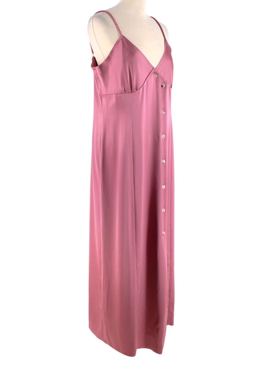 Nanushka Ancens Pink Satin Button Midi Dress

- Slip style, satin midi dress, with button detail down the front
- Shoestring straps with gold-tone adjustors
- Gently gathered bust cups
- Fluid fabric, with relaxed cut
- Unlined

Materials:
78%