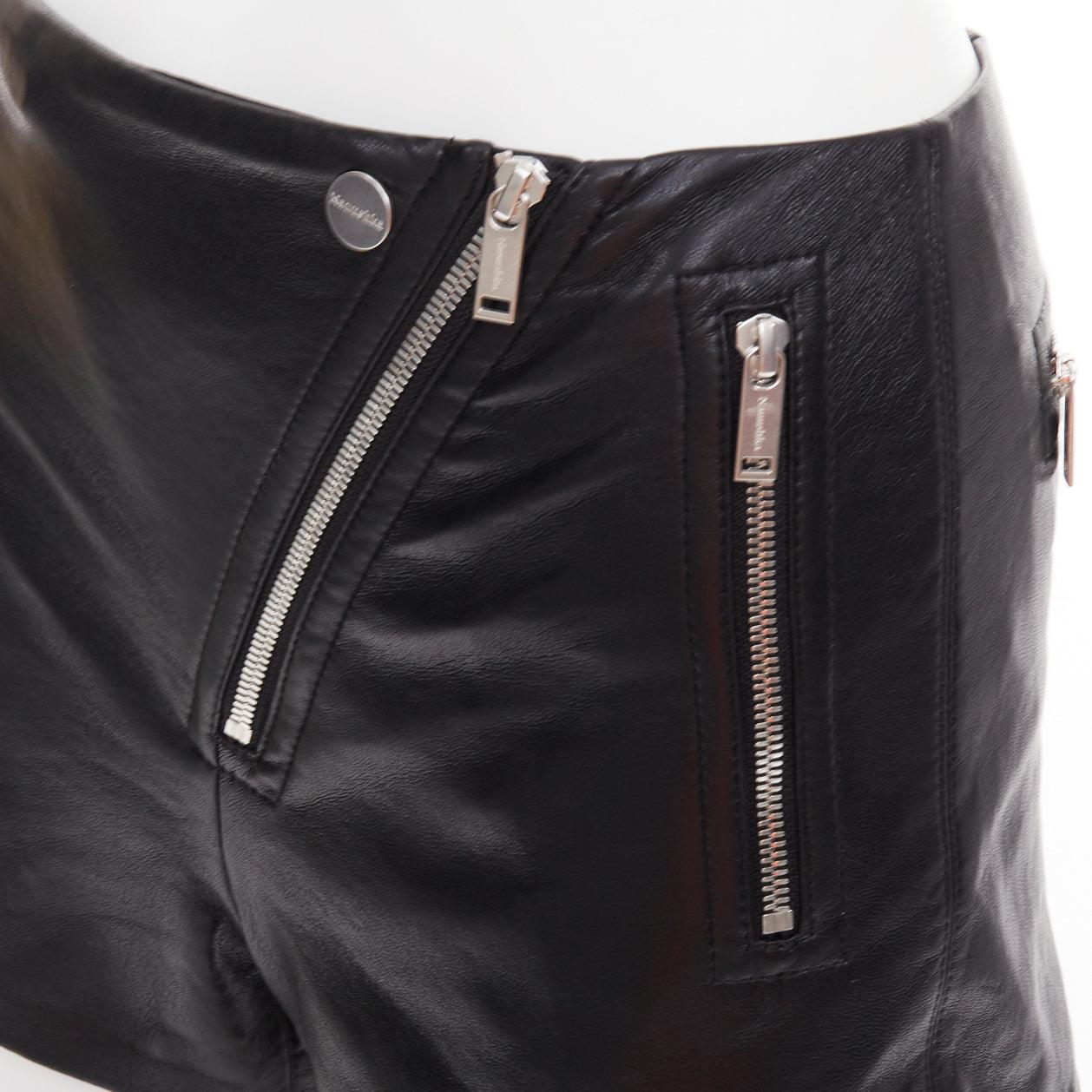 NANUSHKA black faux leather diagonal zip short mini biker shorts XXS
Reference: AAWC/A01549
Brand: Nanushka
Material: Polyester
Color: Black, Silver
Pattern: Solid
Closure: Zip
Lining: Black Fabric
Extra Details: Black shorts featuring an off-centre