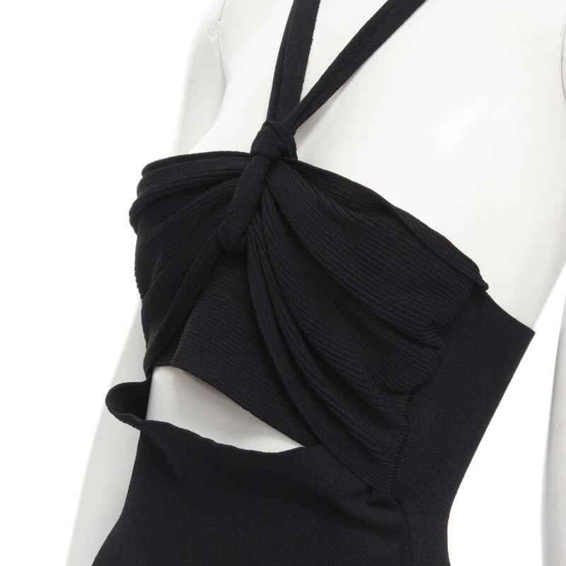 NANUSHKA black twist V strap cut out under bust knitted woven stretch top S
Reference: LNKO/A01906
Brand: Nanushka
Color: Black
Pattern: Solid
Estimated Retail Price: USD 1100

CONDITION:
Condition: Excellent, this item was pre-owned and is in