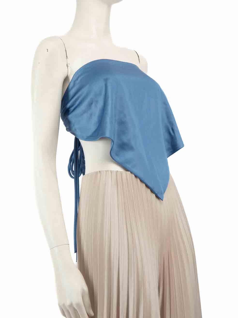 CONDITION is Very good. Minimal wear to the top is evident. Light marks to the rear centre and missing size label on this used NANUSHKA designer resale item.
 
 
 
 Details
 
 
 Model: Stina
 
 Blue
 
 Synthetic
 
 Scarf top
 
 Sleeveless
 
