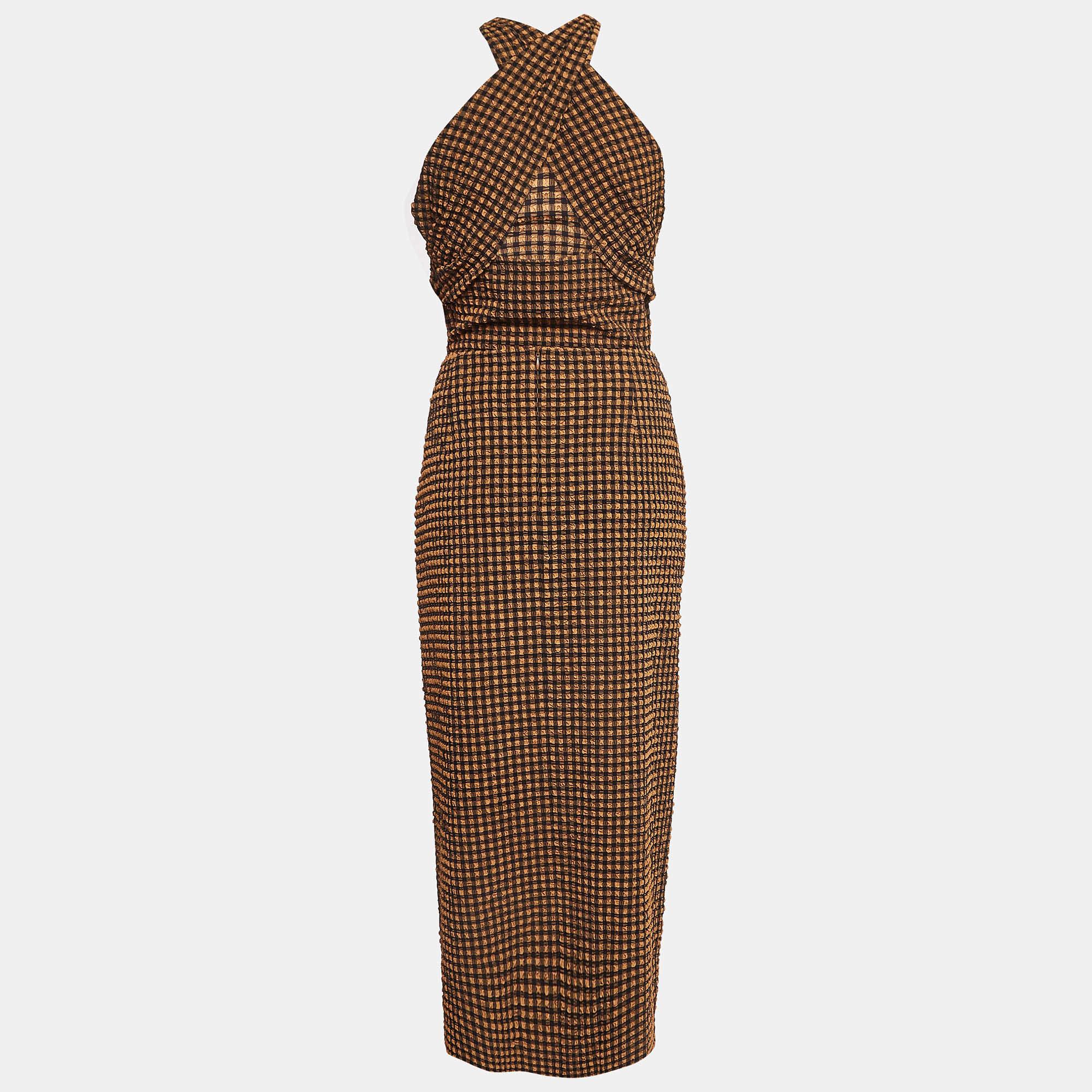 Caratterizzato da una sartoria impeccabile, da una buona vestibilità e dall'uso di tessuti pregiati, questo set gonna e top ti aiuterà a sfoggiare un look elegante. Abbinala a tacchi o ballerine per esaltare il fascino della creazione.