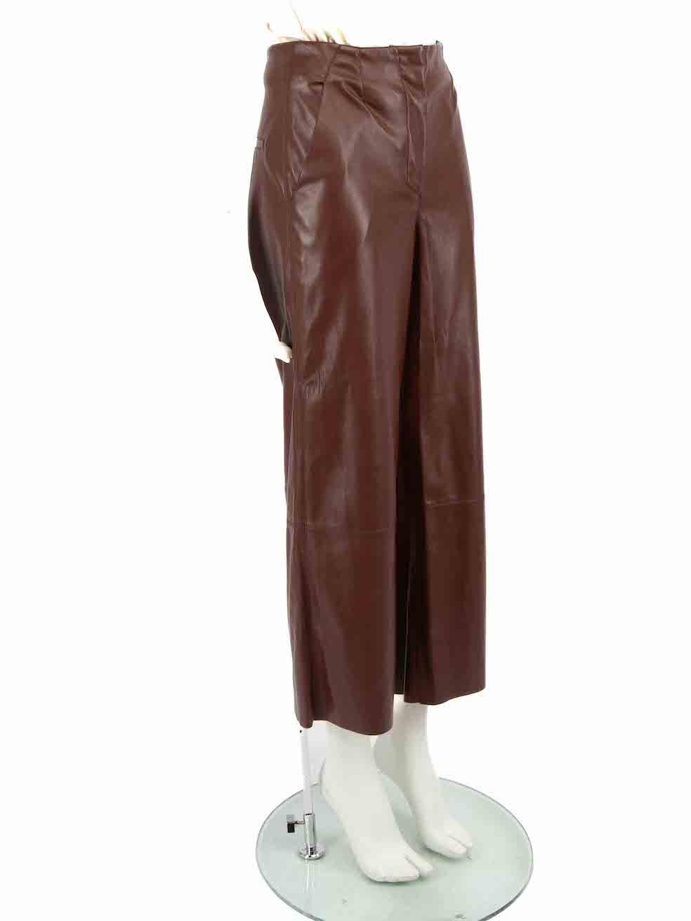 CONDITION is Very good. Hardly any visible wear to trousers is evident on this used Nanushka designer resale item.
 
 Details
 Brown
 Vegan leather
 Trousers
 Straight leg
 High rise
 2x Side pockets
 Zip, hook and button fastening
 
 
 Made in