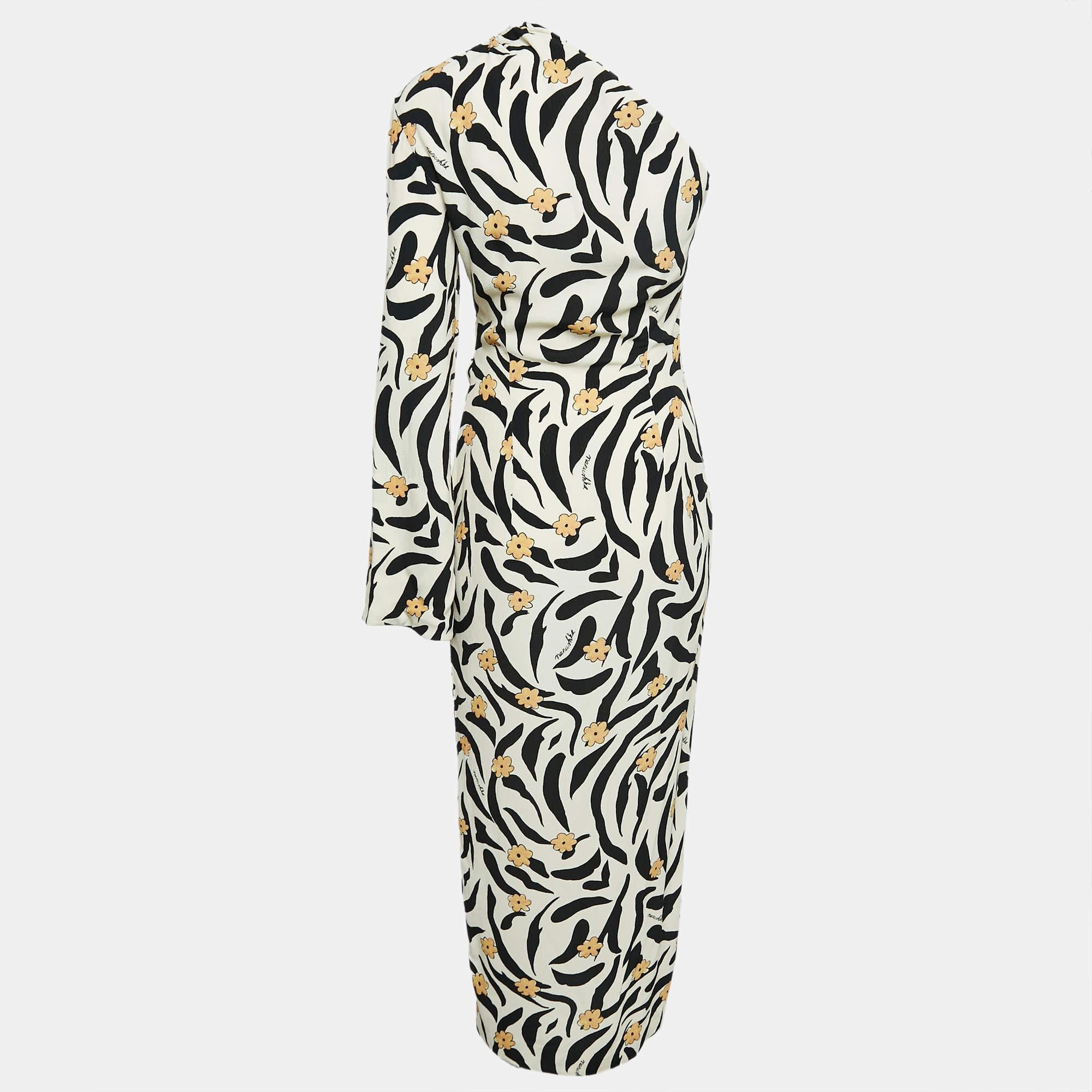 Eleg associe élégance et style audacieux avec la robe midi en crêpe à imprimé floral et animalier crème de Nanushka. Cette silhouette à une épaule dégage un charme moderne, tandis que le design enveloppant offre une coupe flatteuse. Confectionné en