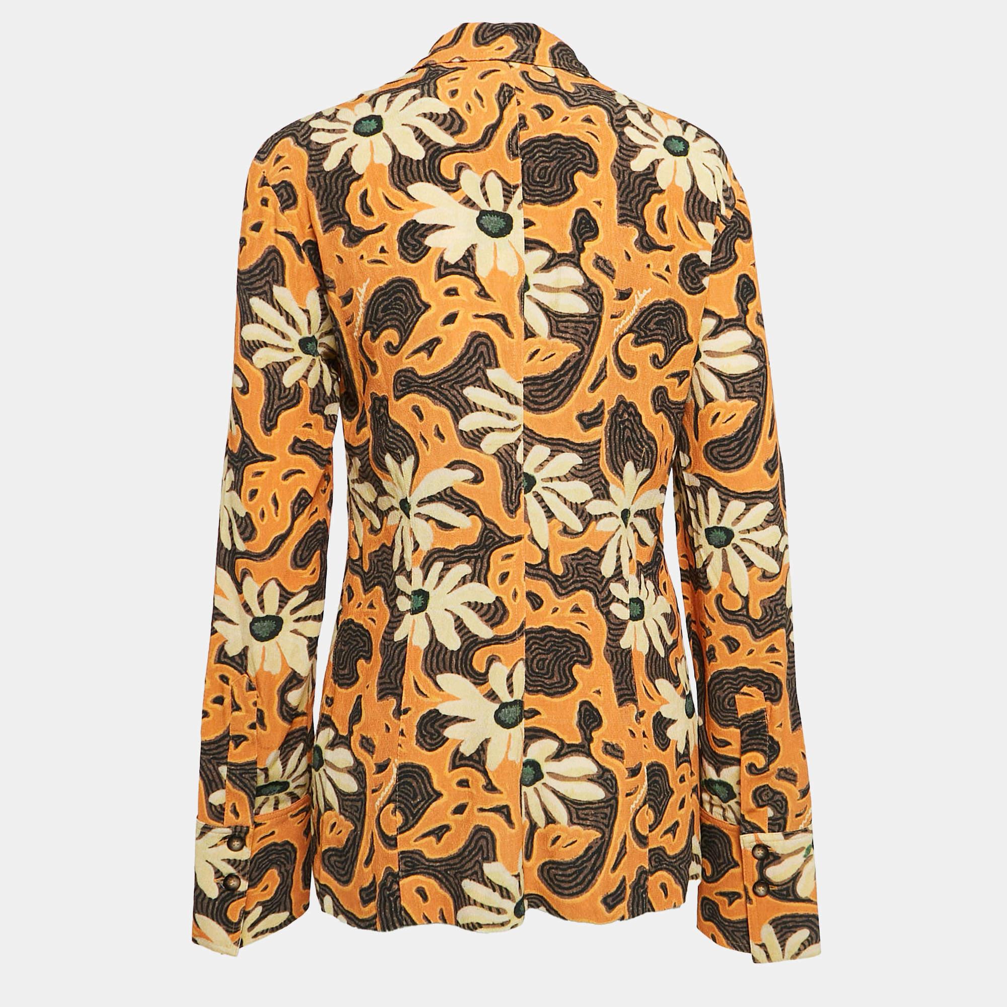 Questa camicia firmata è favolosa. È realizzata con materiali pregiati e presenta una silhouette aderente. Abbinalo a pantaloni e mocassini per un ensemble di tendenza.