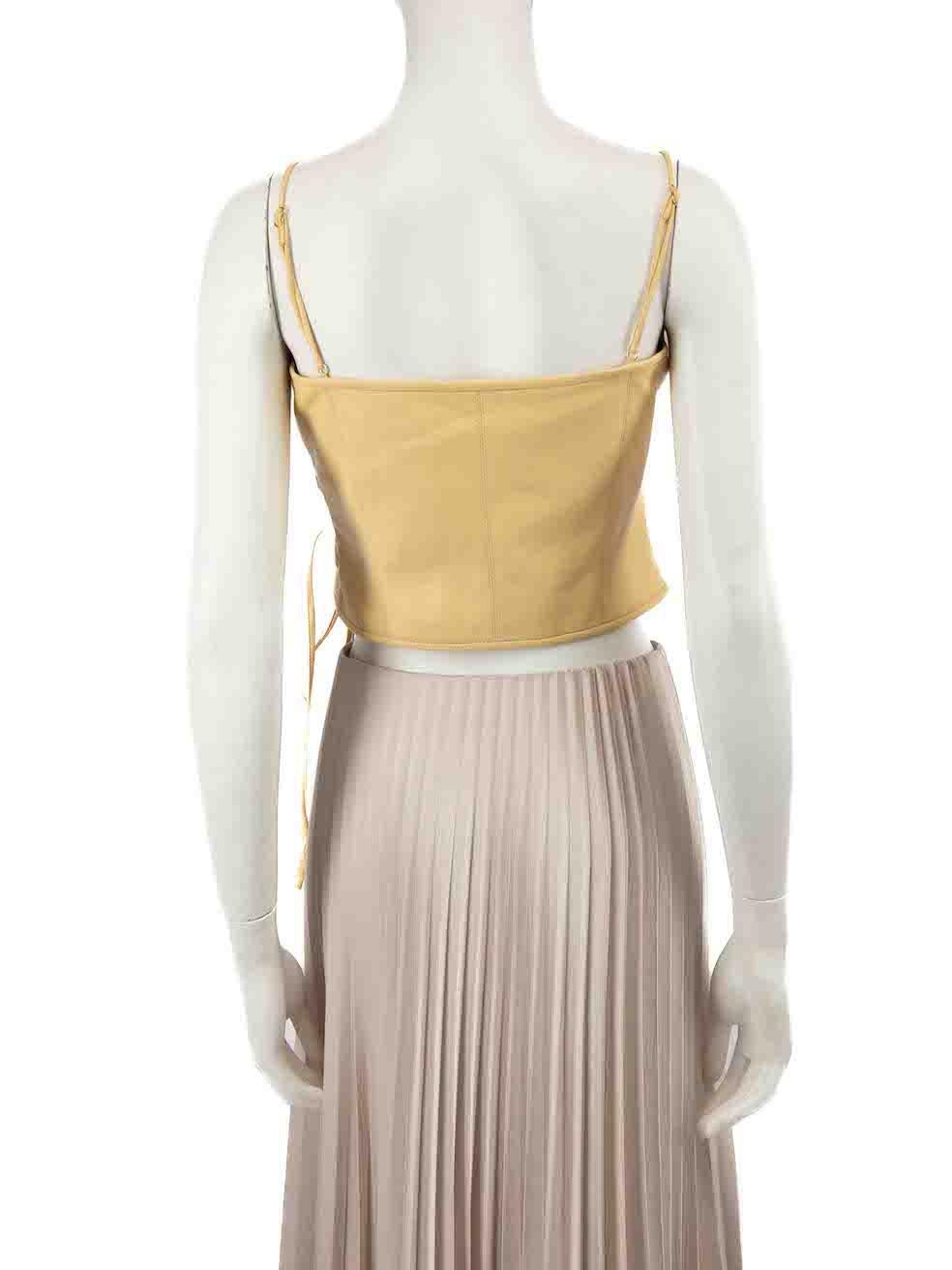 NANUSHKA Top amarillo asimétrico sin mangas Talla M Beige en venta