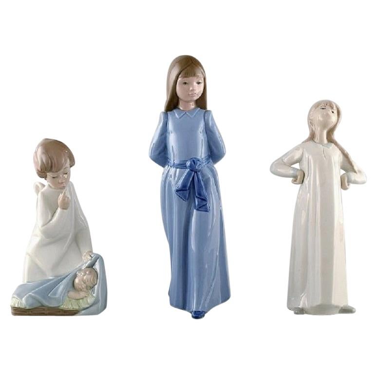 Nao and Lladro, Three Porcelain Figures, 20th Century For Sale