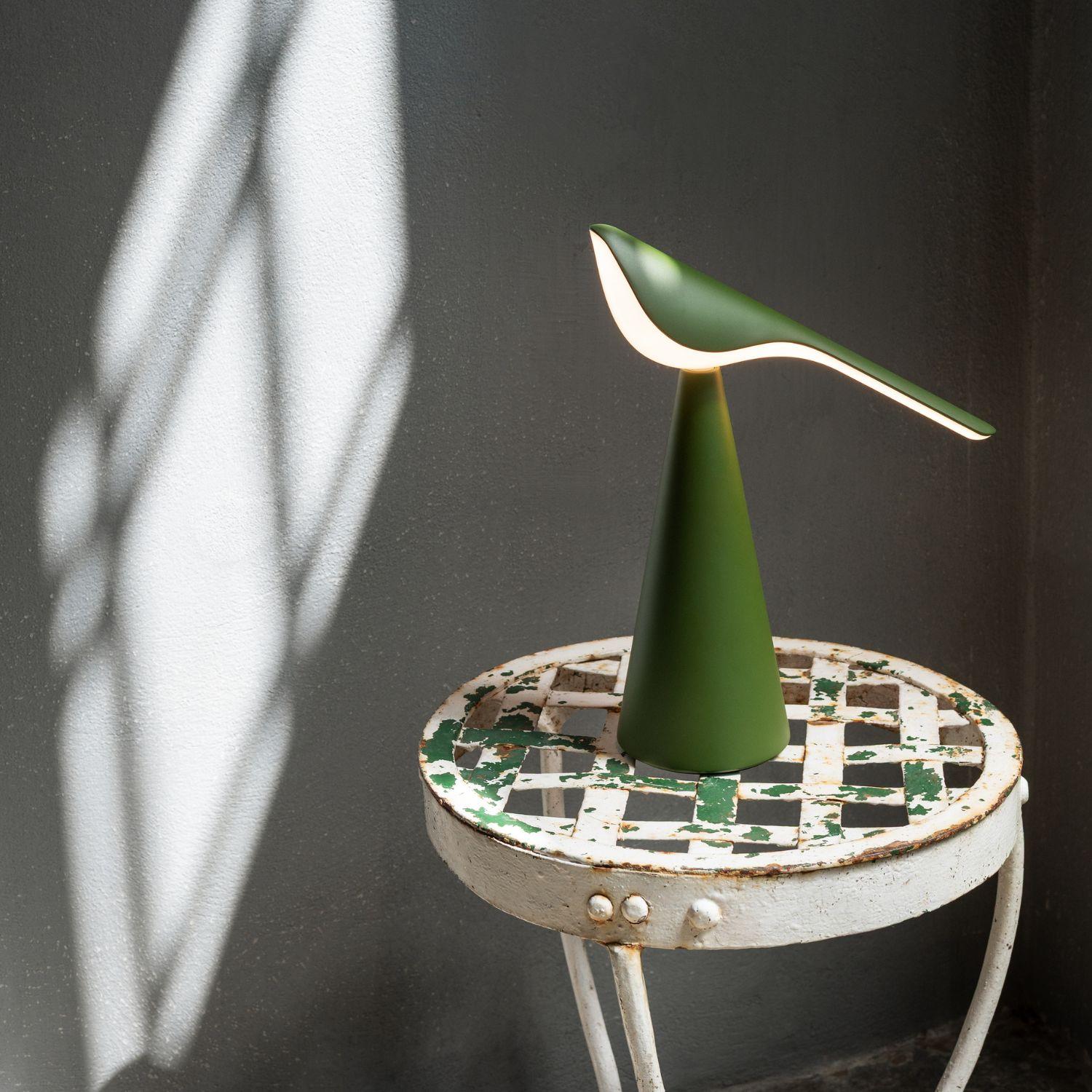Nao Tamura 'Tiki' Portable Table Lamp in Olive Green for Established & Sons

These brilliantly designed bird-like lamps use a futuristic form to animate and evoke character. The flawless acrylic shade balances above a metal formed base resulting in