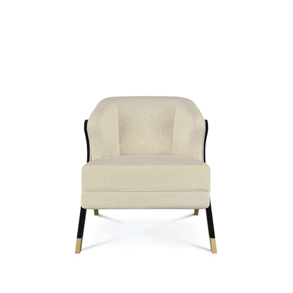 Svelte lines and a feminine silhouette captures the less-is-more design of the Naomi chair. A plush upholstered seat is delicately framed by chicly lacquered mid-century modern legs stylishly capped in metal.

Materials & Finishes: 
Upholstery: