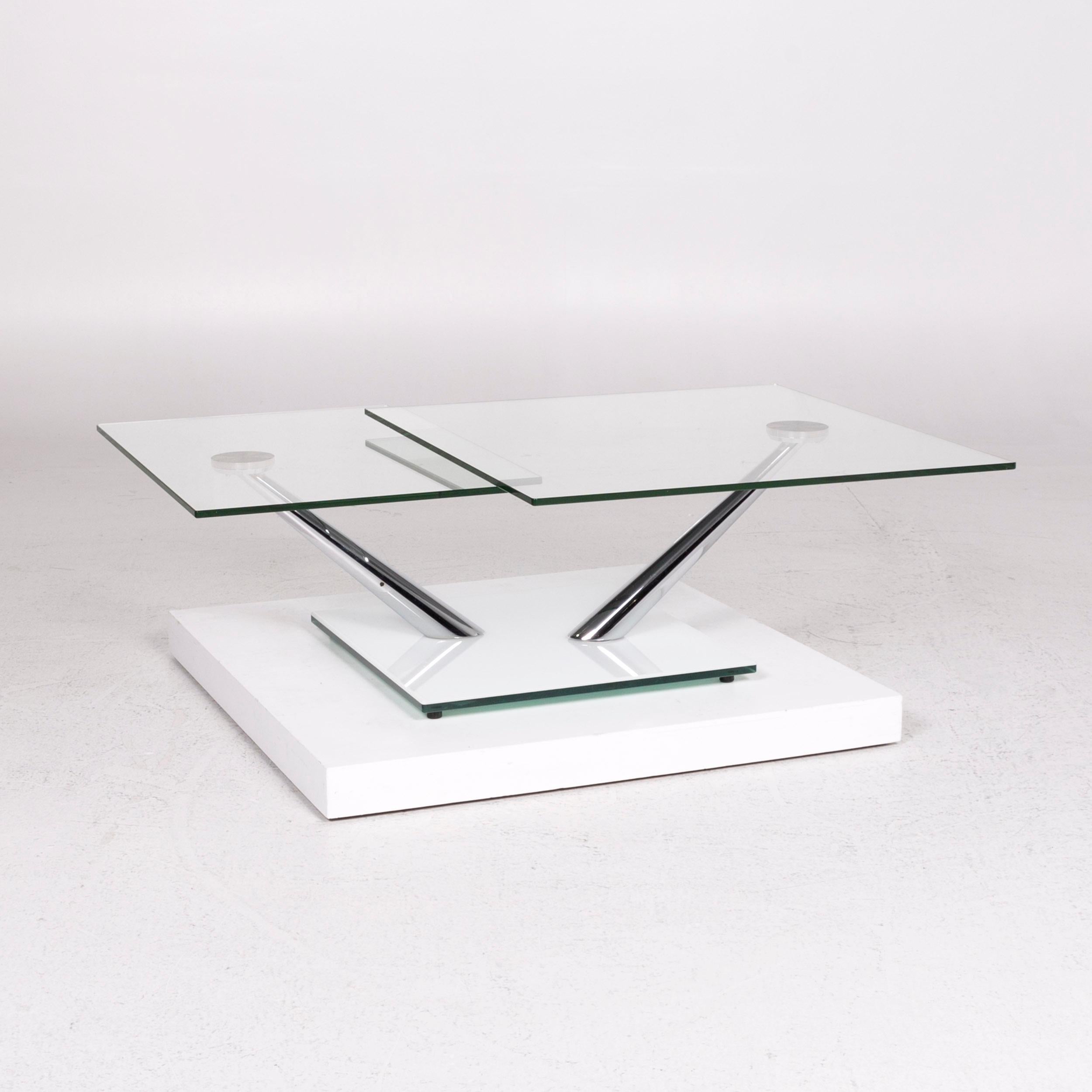 We bring to you a NAOS glass table silver adjustable function table.
 SKU: #12192
 

 Product Measurements in centimeters:
 

 depth: 87
 width: 87
 height: 40
 seat-height: 
 rest-height: 
 seat-depth: 
 seat-width: 
 back-height: