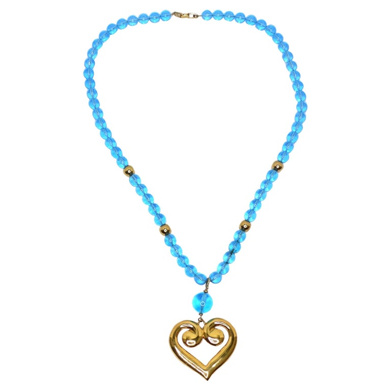 Authentic Louis Vuitton Blue Charm on 18K Gold Filled Bead Necklace.