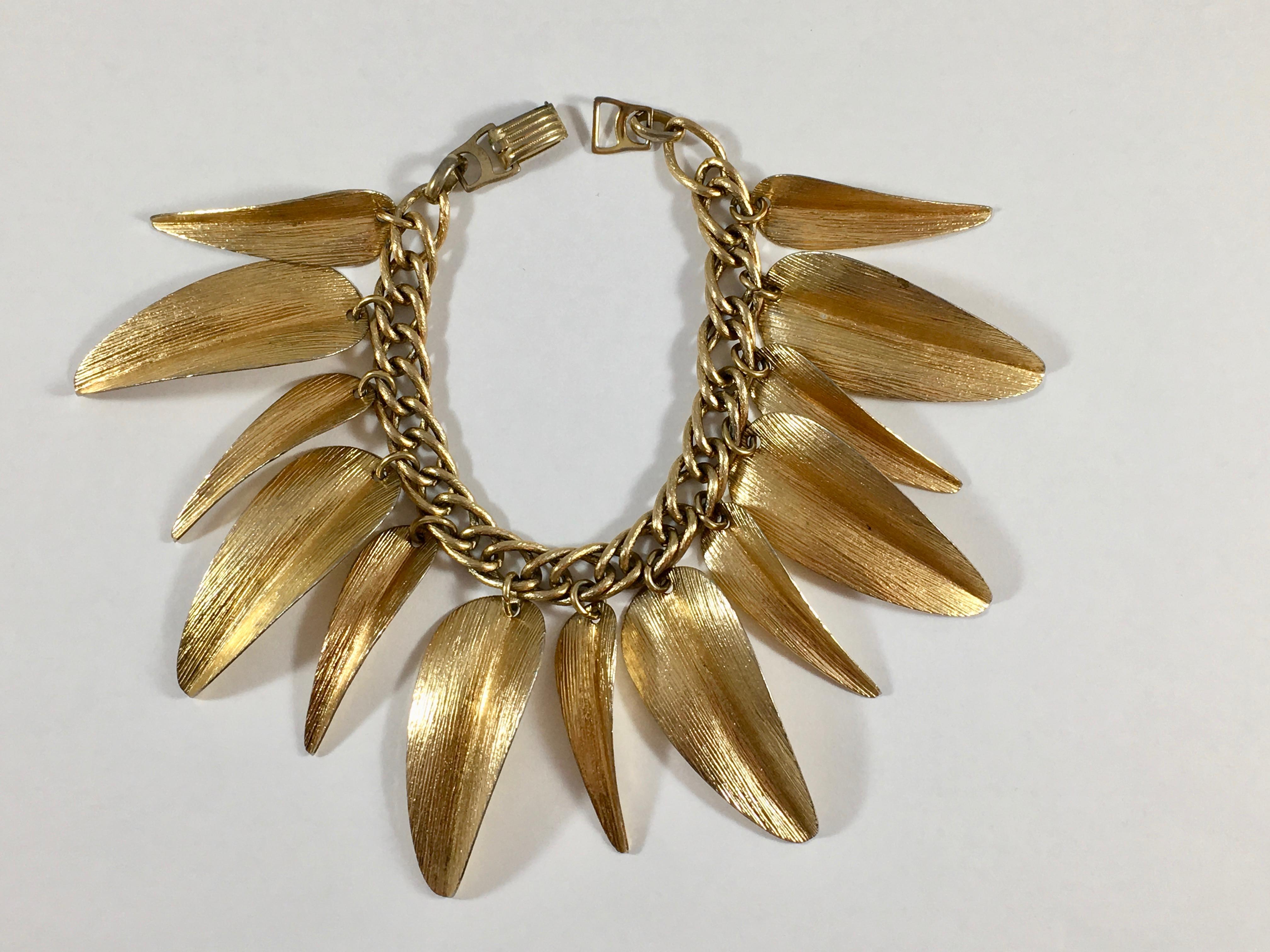 This is an amazing goldtone Napier leaf bracelet from Napier's 'Willow' collection designed in 1955 by Eugene Bertolli. The Willow necklace and bracelet set were presented to and worn by Miss America, Sharon Kay Ritchie in 1956 (see image #10). The