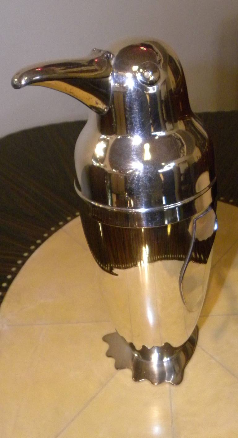 Iconic Napier cocktail shaker, restored and designed by Emile Schulke in 1936. The penguin has become one of the most popular figural shakers, this is an original not a reproduction. It comes with a detachable top and the peak opens up. It is