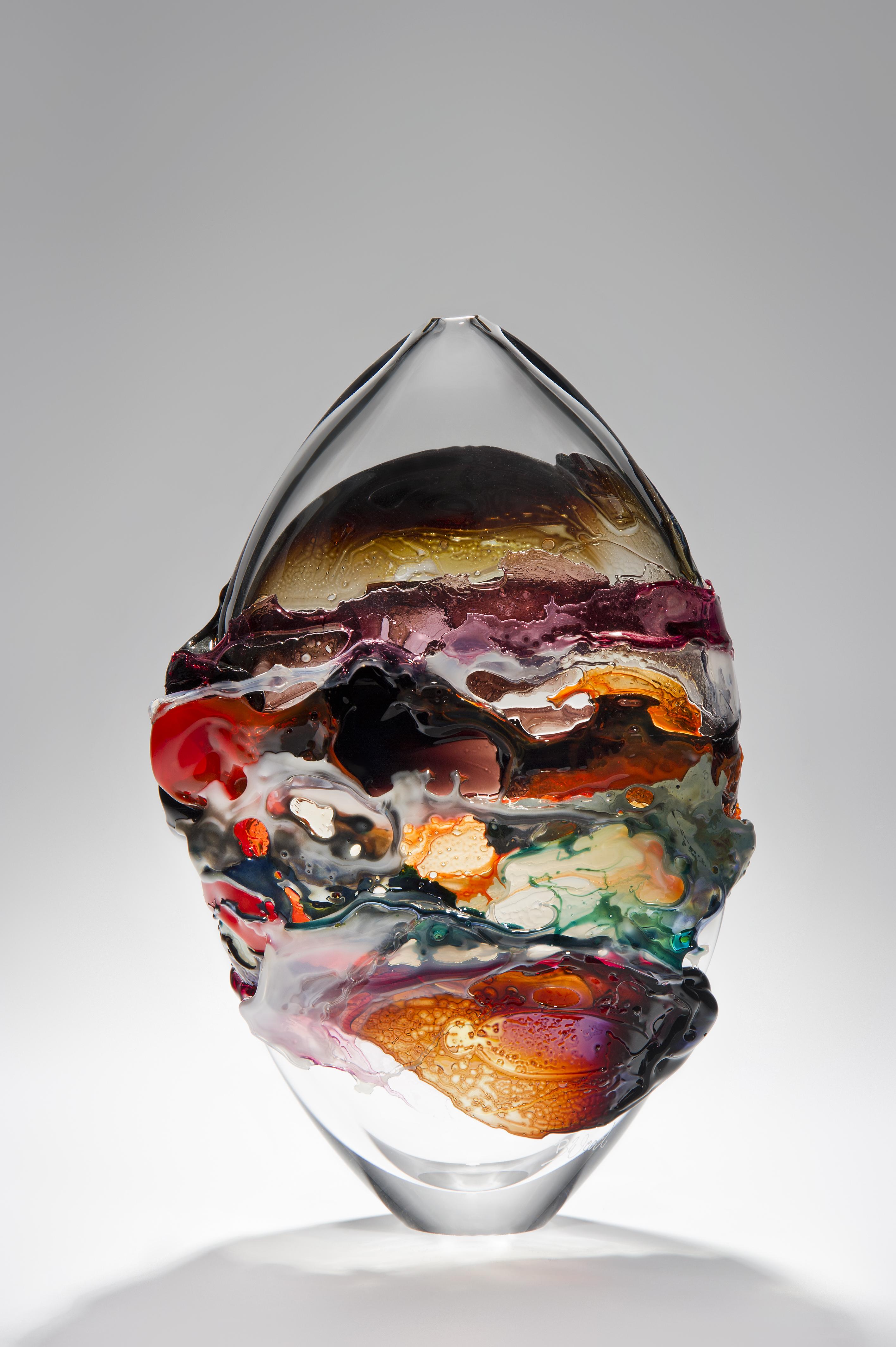 Naples II is a unique orange, brown and mixed colored glass vase from the Molten Landscapes collection by the British artist Bethany Wood. An equal passion for painting physically inspires how she controls and manipulates her glass. Recreating the
