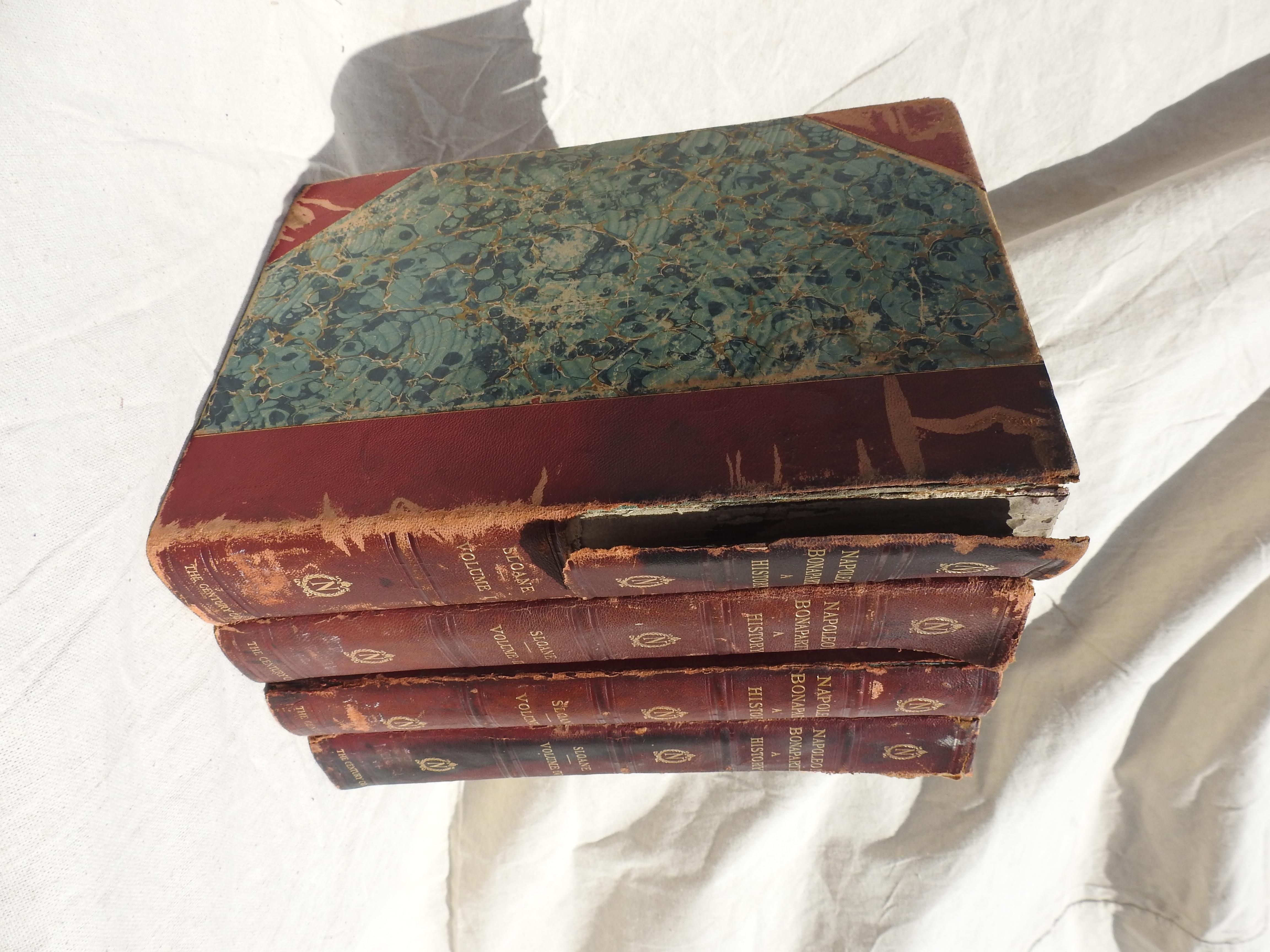 Volumes 1-4, Napoleon A History. Bound in leather and board. Spines are ripped a little but in tact.