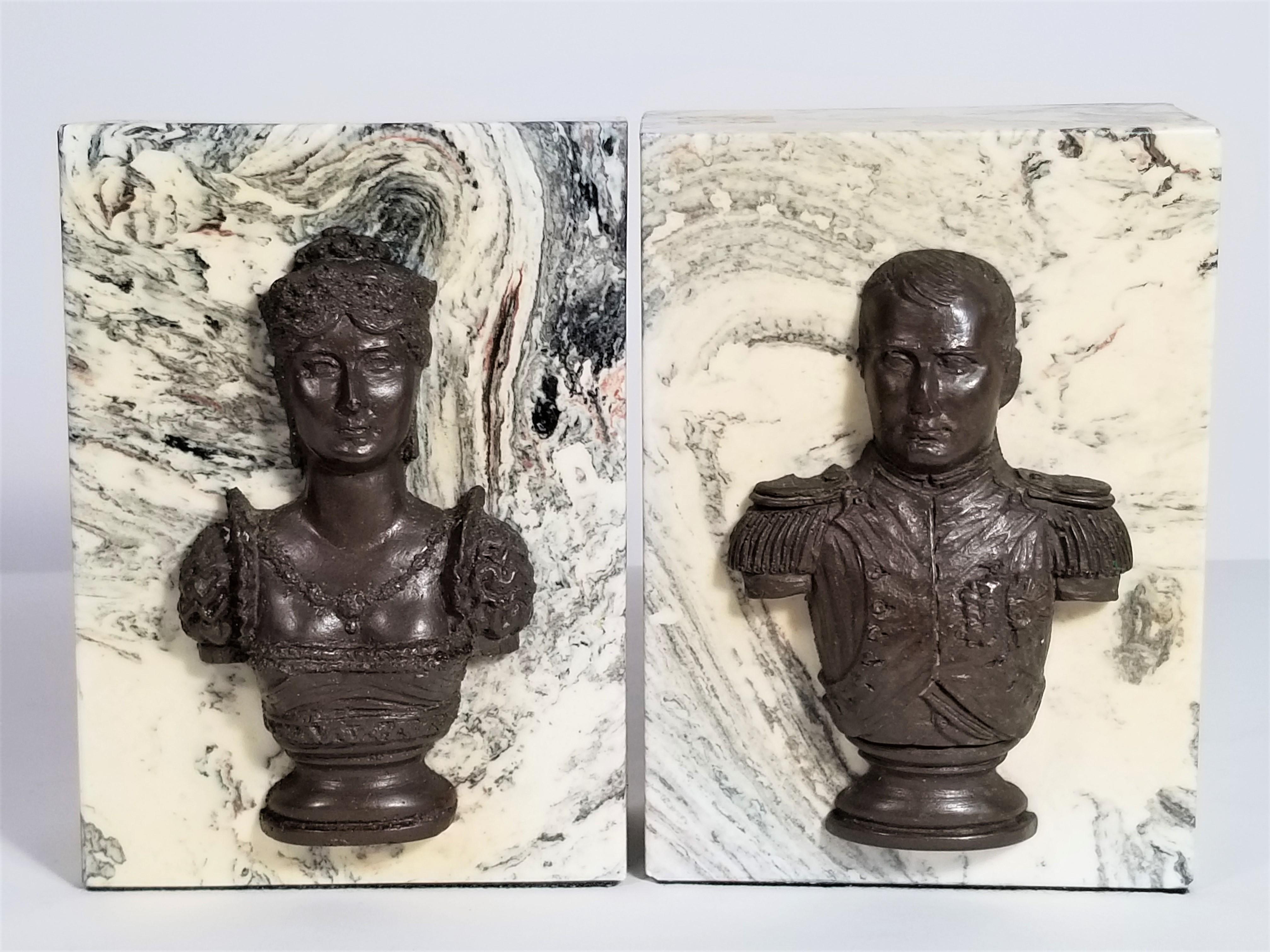 Midcentury Napoleon and Josephine marble and bronze bookends. Substantial in weight. Felt on bottom and one side.