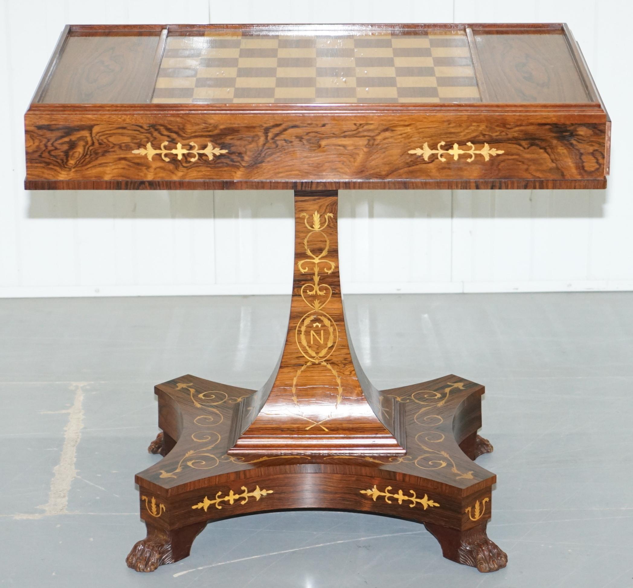 We are delighted to offer for sale this very rare games table with the N for Napoleon Bonaparte below the crown, attributed to designs by Carlo Beccalli and made for the Palace of Fontainebleau during Napoleons occupancy

An Empire style rosewood