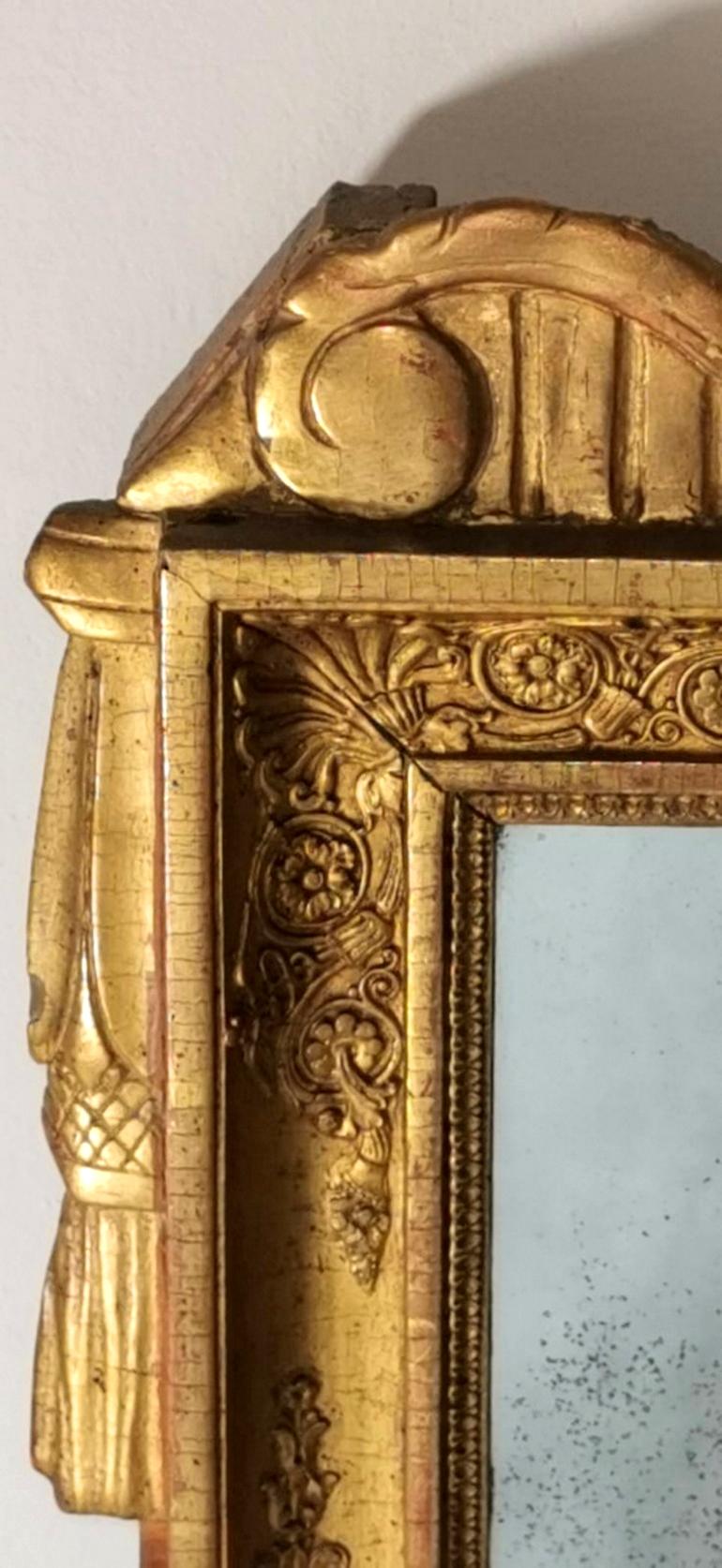 Verre mercuré Miroir français Empire Napoléon Ier en bois à feuilles d'or en vente