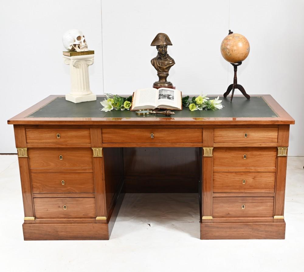 Gorgeous French partners desk in the Napoleon II manner
Hand crafted from kingwood with original ormolu fixtures
Classical columns either side of the knee hole opening in an acanthus leaf design
Desk is a dummer partners desk so there are faux