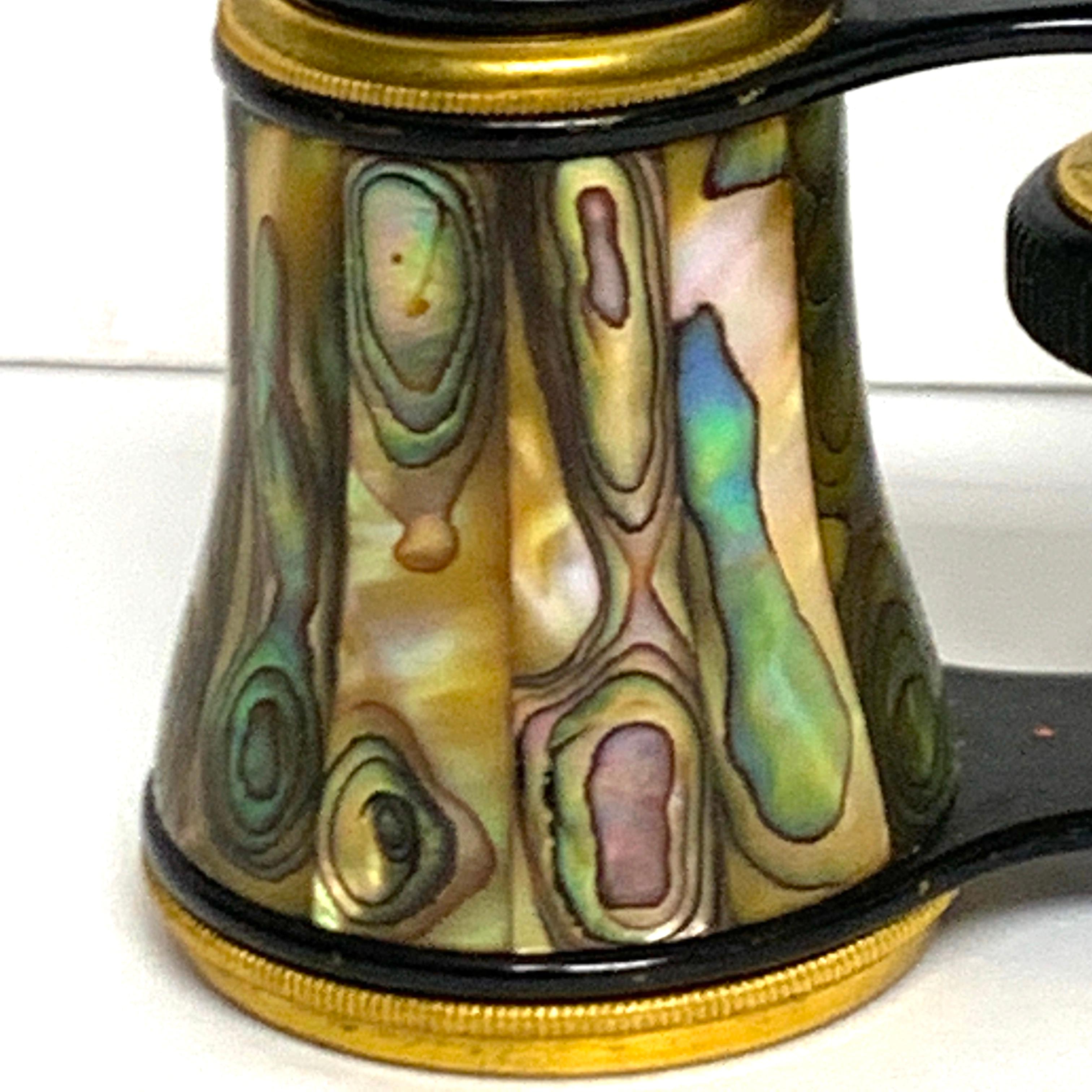 Napoleon III abalone and gilt bronze opera glasses, Paris
Fine and exotic, more than likely made for a gentleman. Older than most, with the gutta percha eye pieces, stamped with the maker and Paris. Smooth working, exceptional clear visual with the