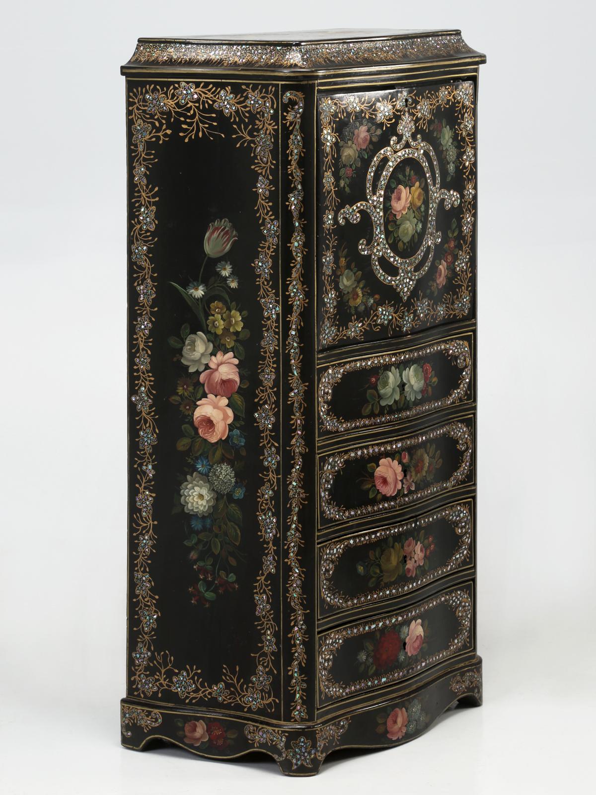 Antique French Napoleon III Secretary in black lacquer with mother of pearl inlay and highlighted with hand-painted flowers. There is some shrinkage damage to the exterior of the case, which can be restored in 2-3-days. This antique French secretary