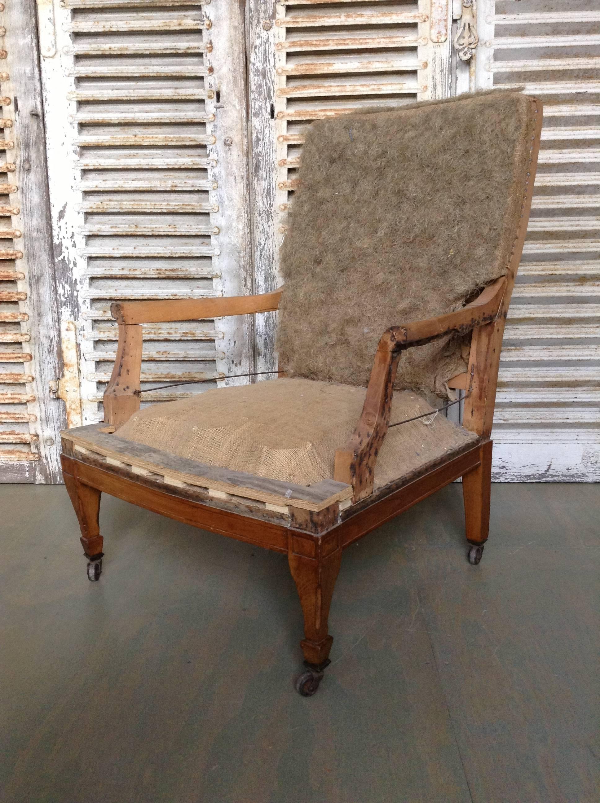 A grand Napoleon III armchair frame. Take your living room to the next level with this classic Napoleon III armchair frame. The perfect complement to a timeless design, it features classic French 19th century craftsmanship and authentic fruitwood