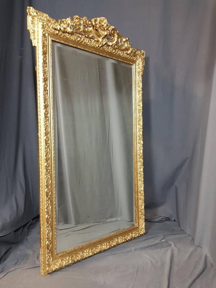 Big size and beautiful Napoleon III in original mercury mirror and giltwood and gilt stucco with refined ornementations.
 